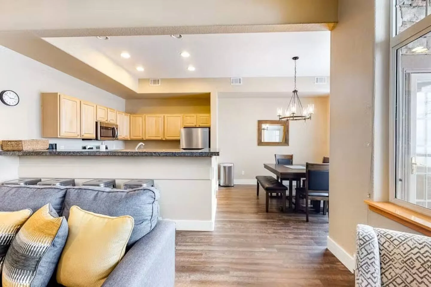 North Pond Retreat, An open view from the living room toward the kitchen and dining area, waterfront vacation rental in Silverthorne, Colorado